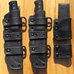 Left sheath: Type-1 sheath for Scout knife w/mounting package.

Right: Type-2 sheath w/mounting package. Belt loop assembly & 1-7/8" rigid mounting strap shown far right.
